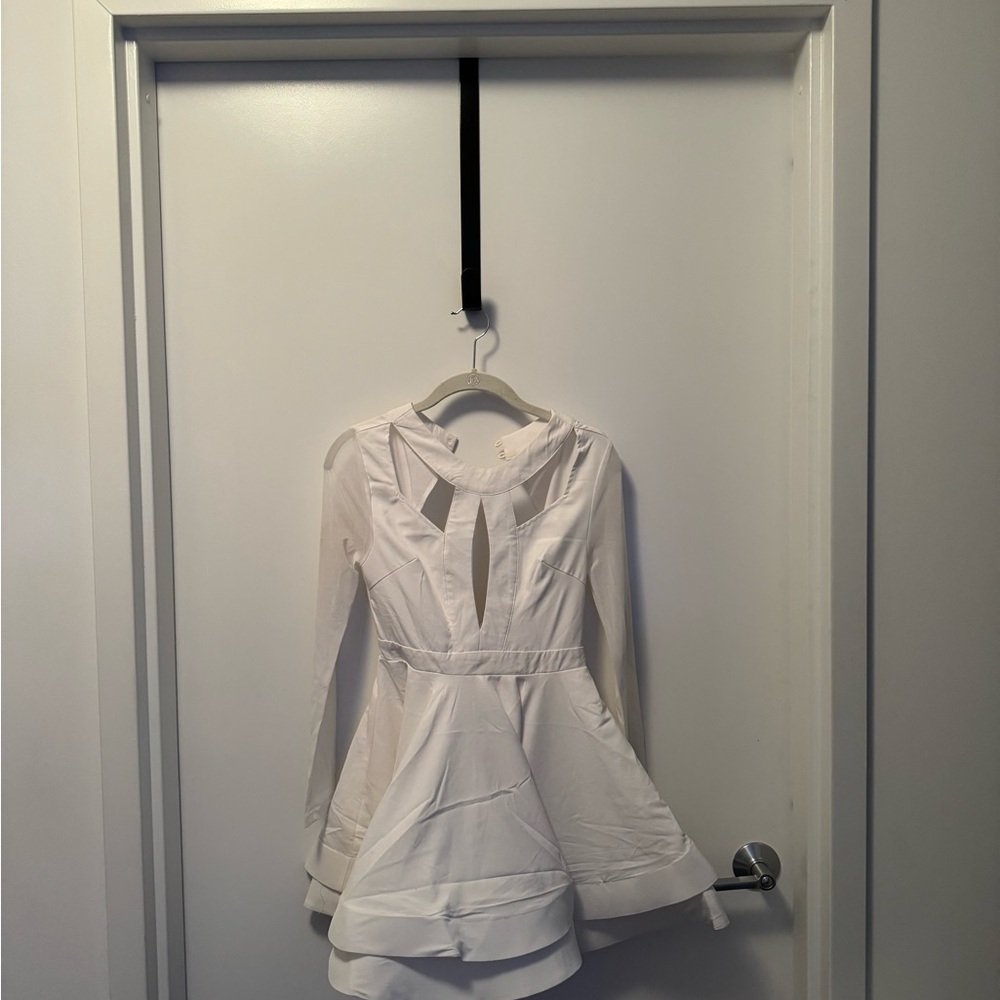 Fun, sexy, cut out, Luxxel Women’s Small white dress.